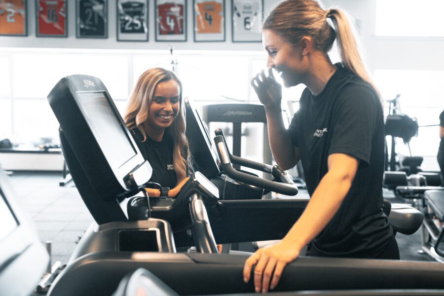 Female Personal Trainer with Female Client on Treadmill