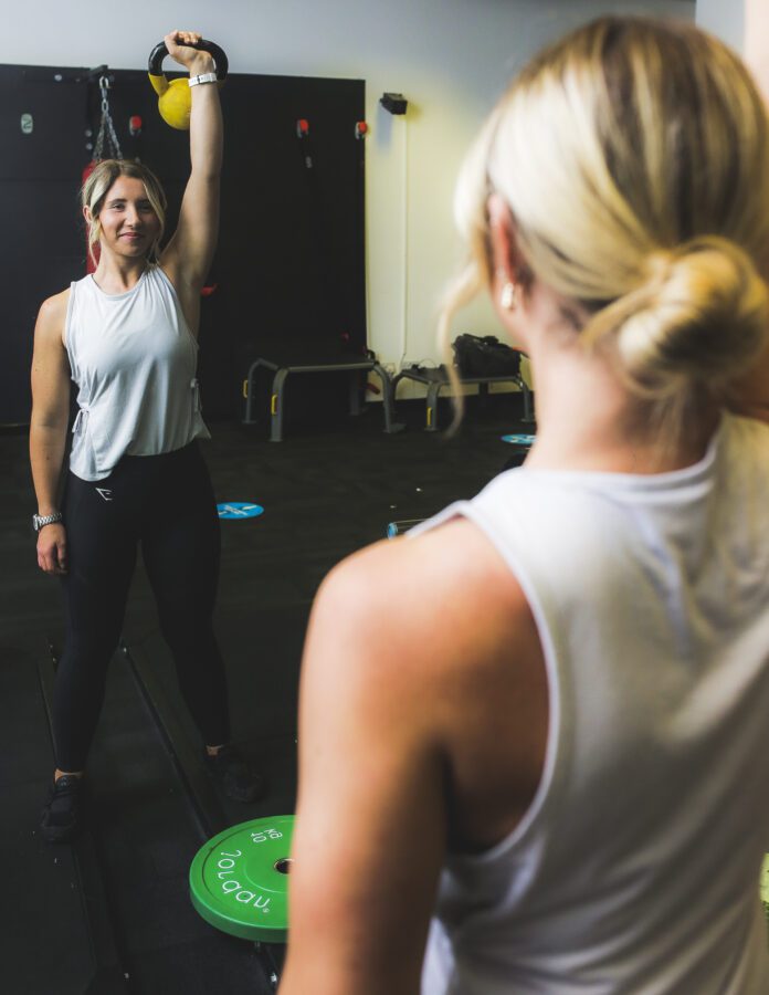 Female Personal Trainer with aa Kettlebell