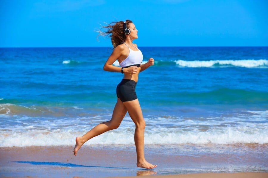 Women Running on the Beach one of the pros of running