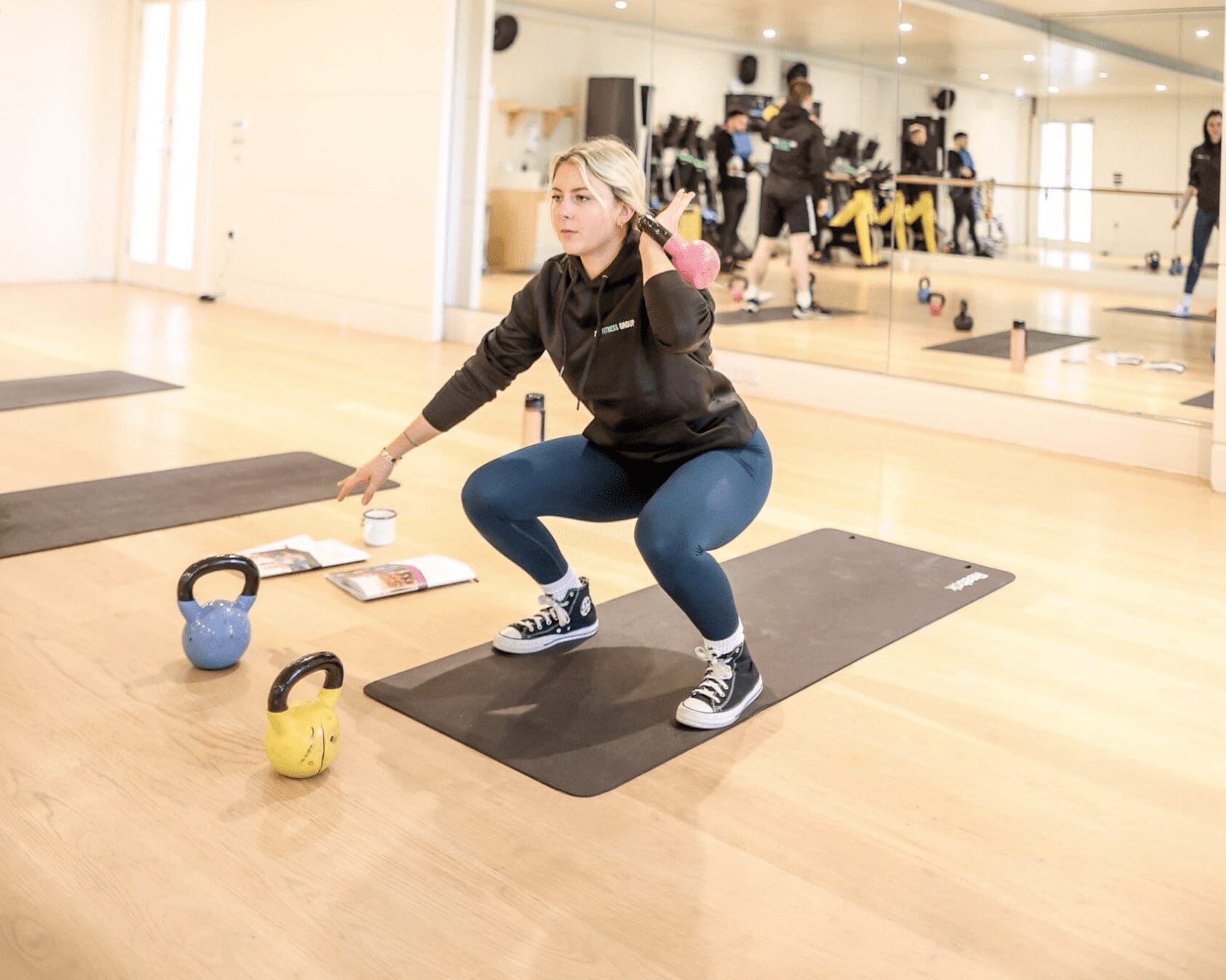 Female kettlebell student on courses at The Fitness Group