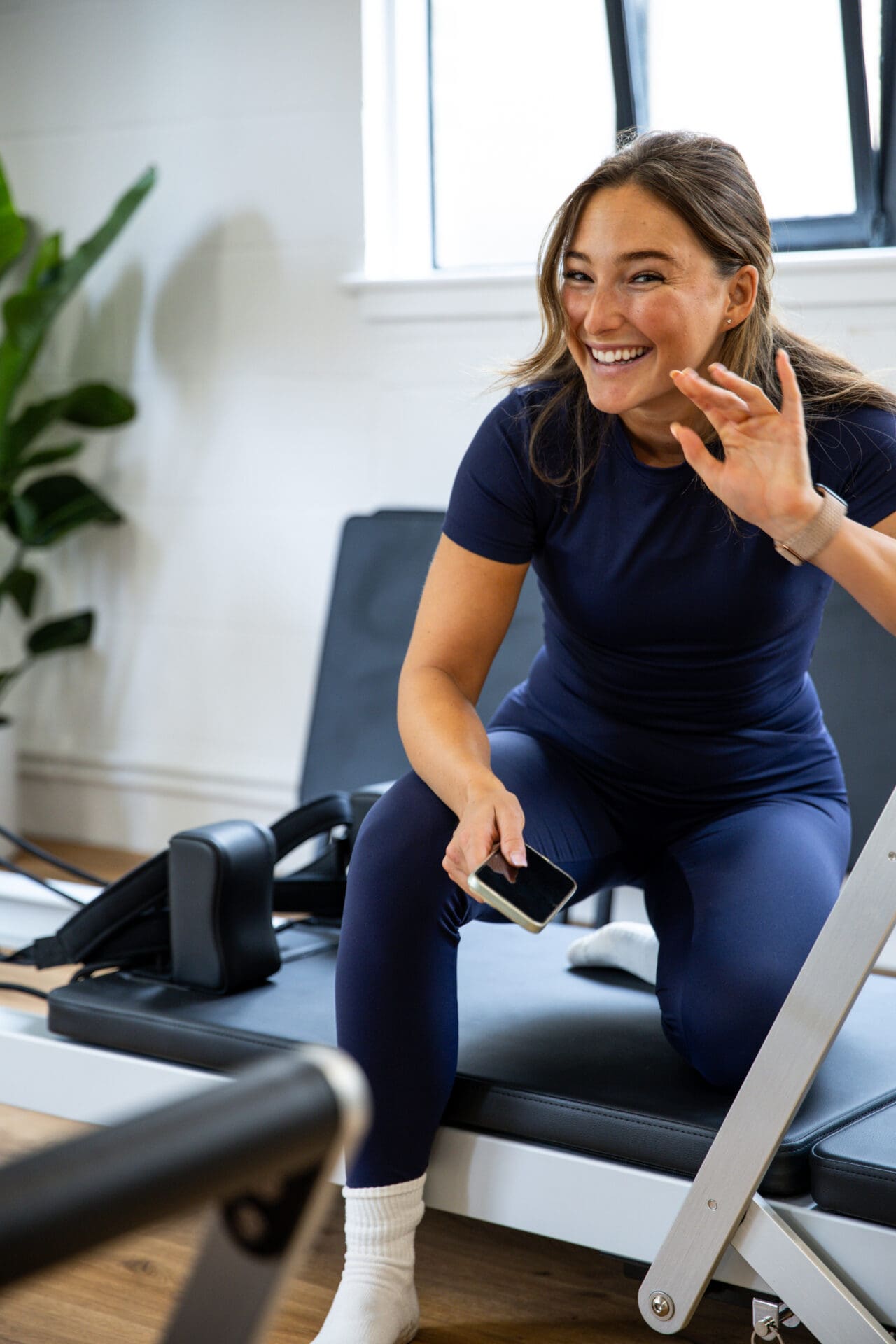 Pilates instructor training at one of the Reformer Pilates Courses.