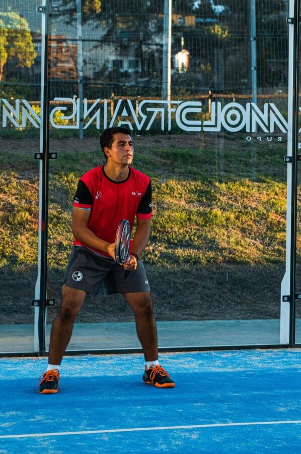 man playing padel tennis man playing padel tennis