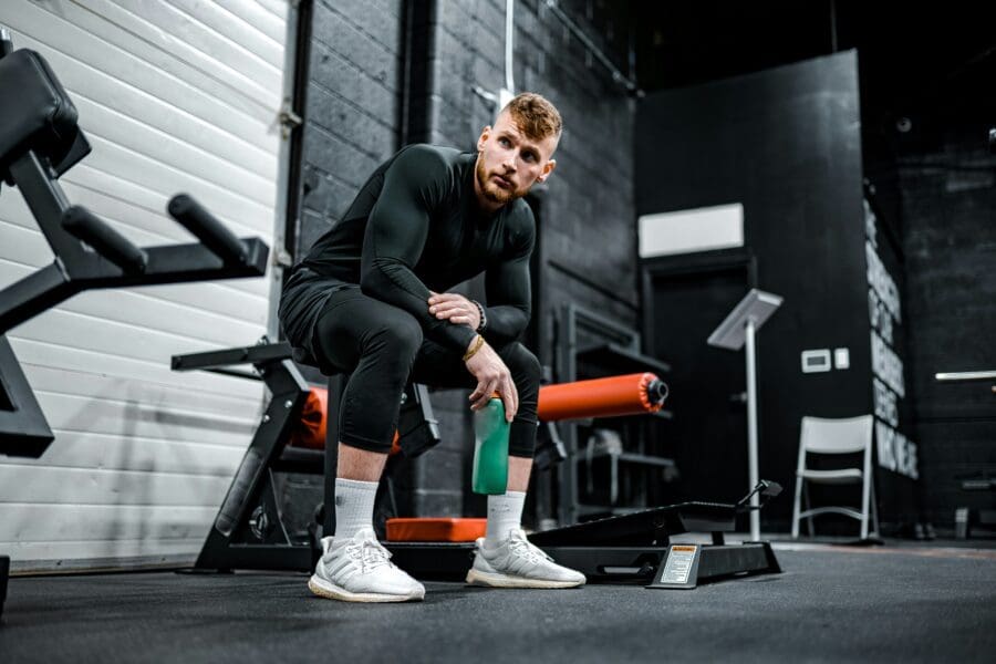A man rests during a workout