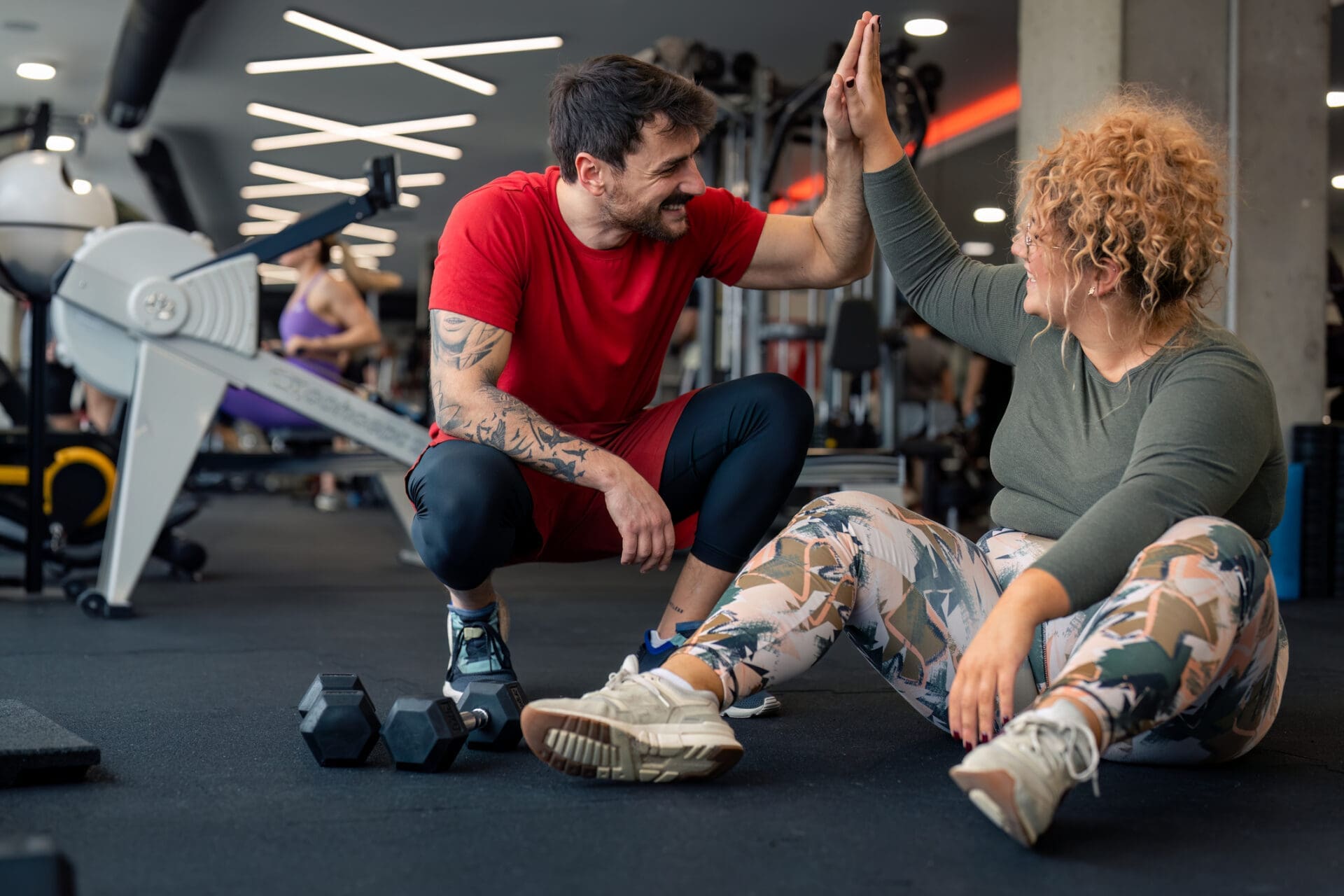 Personal Trainer supporting client in gym – understanding scope of practice and professional boundaries in the UK